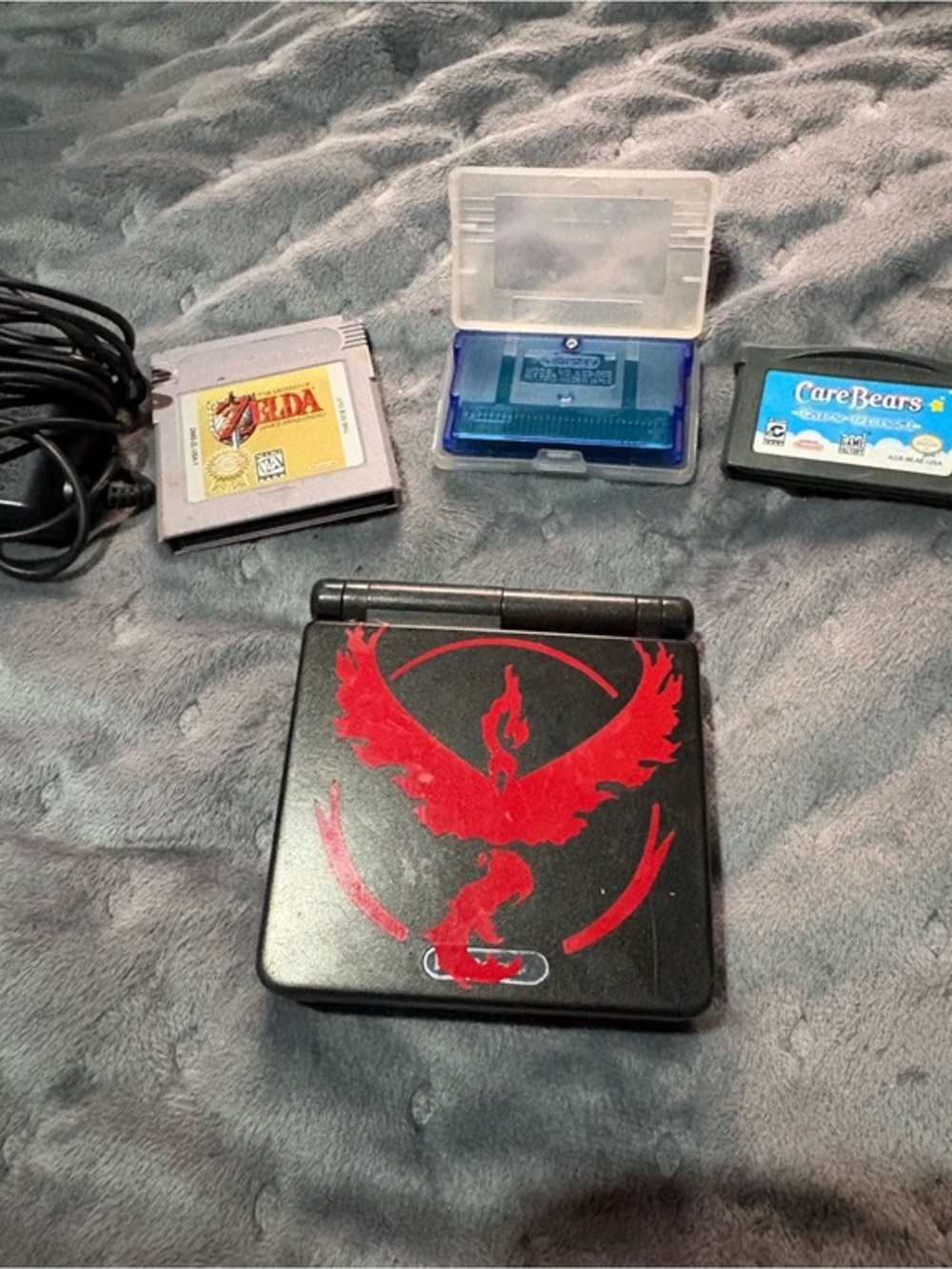 Nintendo Game Boy Advance SP Black with Pokémon sapphire, Zelda, Care Bears